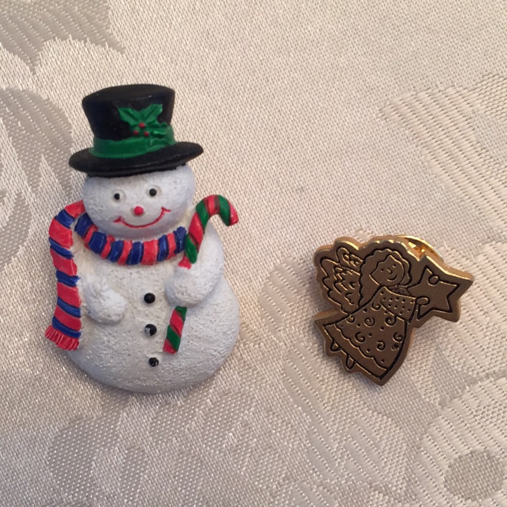 Two small Christmas pins